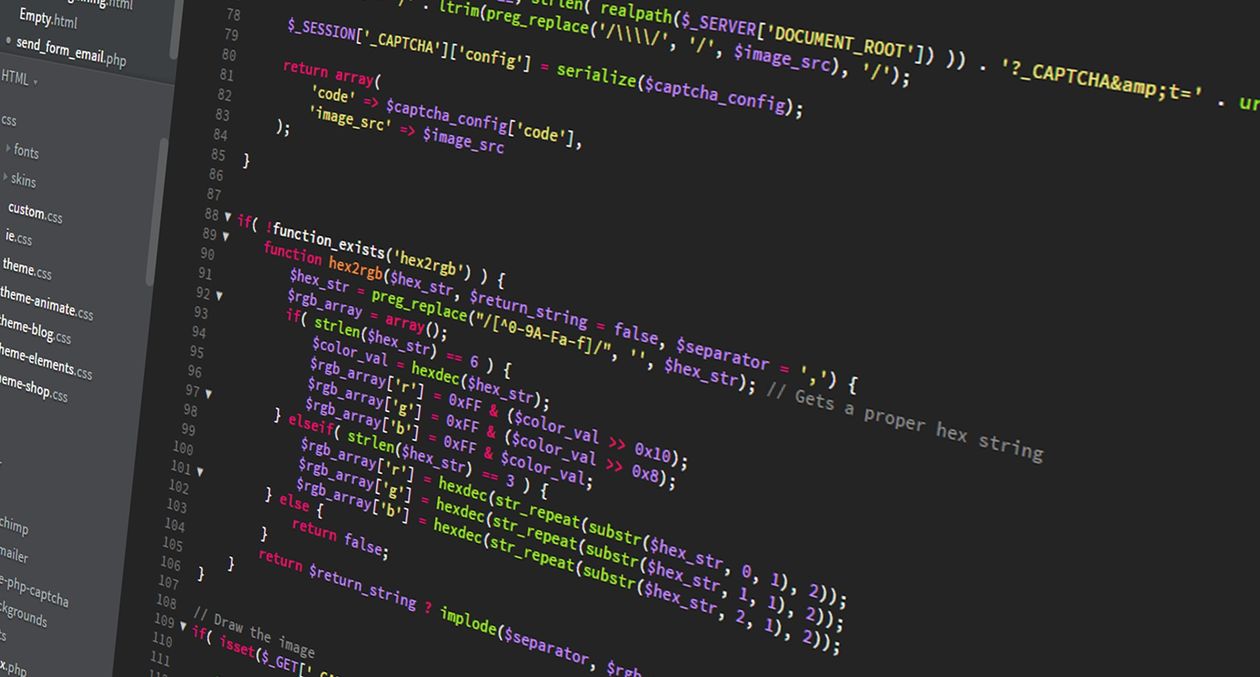 computer screen showing PHP code editor with colorful syntax on dark background