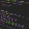 computer screen showing PHP code editor with syntax highlighting on dark background